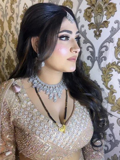 A side profile showcasing the glowing highlight and the soft contour. My signature is creating skin that looks luminous and healthy from every angle.