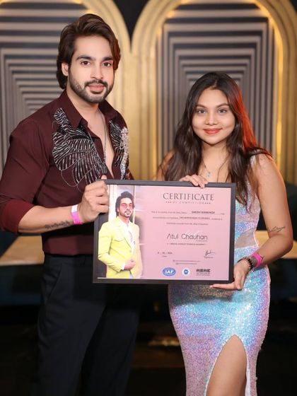 This graduate's glamorous look and confident smile say it all. Congratulations.