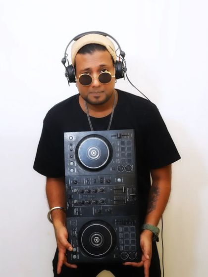 A studio shot with my controller. I don't just play music; I tell stories with sound.