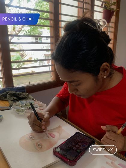 A student adds the final touches to a watercolor portrait. Our certification programs focus on developing the patience and skill required for detailed and expressive work.