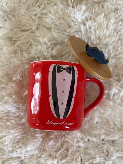 Here is the "Elegant Man" mug in a vibrant red color. This fun and stylish mug is a great standalone gift or an addition to a personalized hamper for him.