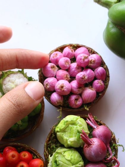 A close-up of my miniature onion and cauliflower baskets.