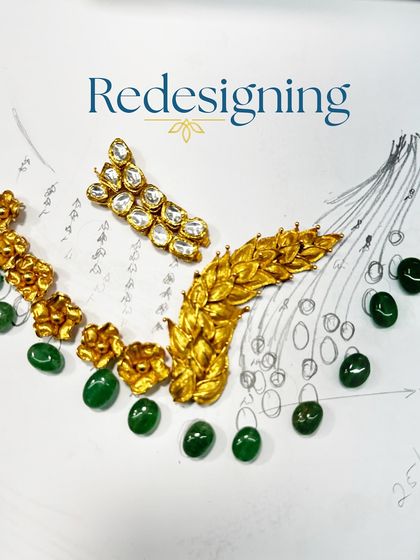 Redesigning in progress. This image shows the initial sketch and the layout of the old gold pieces and new emeralds, giving a glimpse into how we plan a transformation.