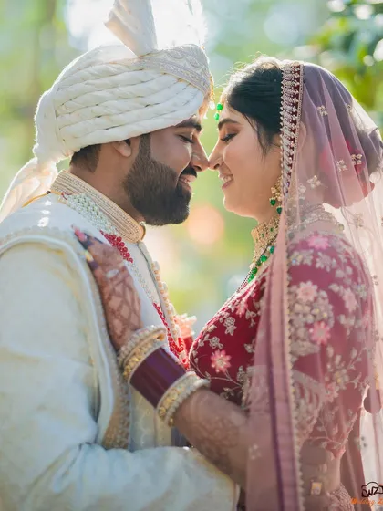It's all about the connection. This intimate, sun-kissed close-up from a Sindhi wedding highlights the tender emotions and quiet understanding between a couple on their special day.