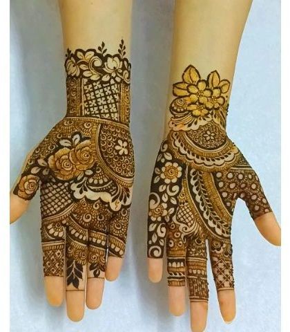 A beautiful example of a non-bridal design, with different floral and geometric patterns on each hand for a unique, modern look.