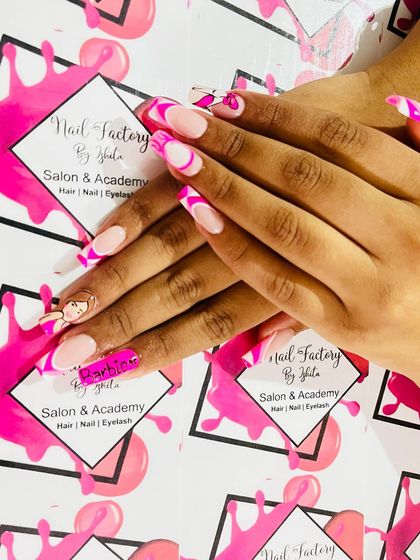 A close-up of the Barbie nails against my branded background.