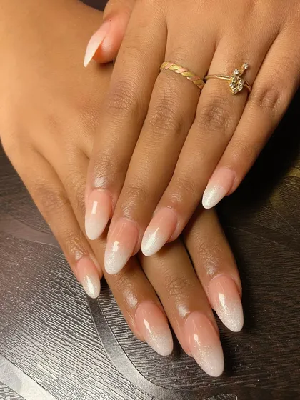 Ombre nails with a tint of pearl shimmer. A perfect manicure is the finishing touch to any look, and this elegant style is a favorite among my brides.