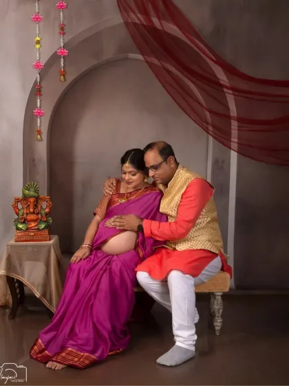 Another loving moment between the couple, seated together in the traditional setup. Their connection is the heart of the photo.