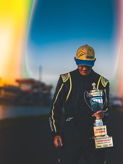 A moment of quiet reflection with the 2nd Runner-Up trophy from the National Championship. Every trophy represents a season of ups and downs, and the resilience to overcome them.