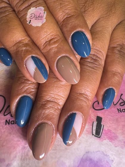 A chic and modern color-blocked design with shades of blue, brown, and pink.