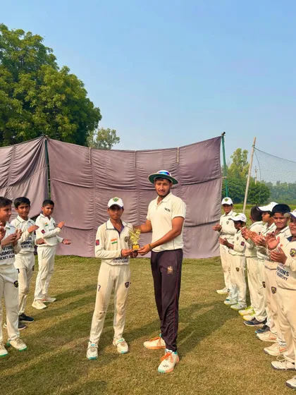 The Player of the Match, Apurv Tyagi, receiving his award.