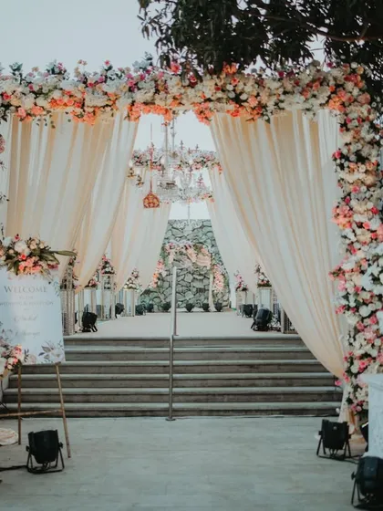 The entrance to your event is the first page of your story. For this wedding at The Westin Powai, we created a stunning floral archway with elegant drapery and chandeliers, setting a tone of romance and grandeur from the very first step.