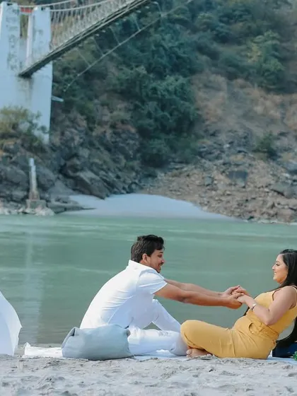 A romantic picnic setup on the banks of the Ganges in Rishikesh. I help couples plan these unique concepts to make their pre-wedding shoot personal and memorable.