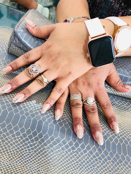 A soft, shimmery glitter nail that looks delicate and beautiful.