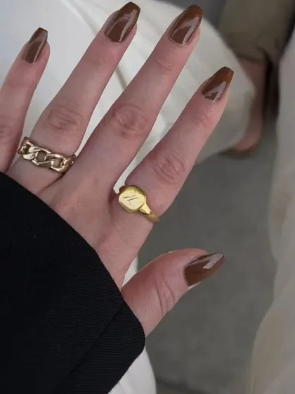 A close-up of this beautiful warm brown polish on coffin-shaped nails.