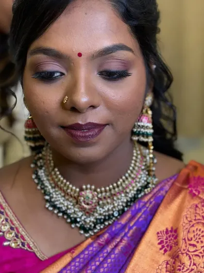 A detailed shot of Priyanka's reception eye makeup. The soft smokey effect is blended beautifully to enhance her eye shape.