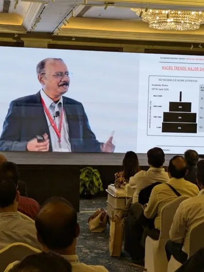 Our Founder & CIO, Anil Rego, presenting on our proprietary MultiBagger Framework for PMS strategies. This image captures him on the big screen, sharing deep insights with a large audience of investors in Delhi.