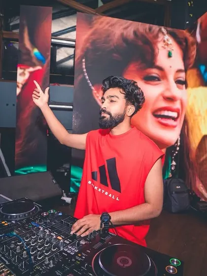My setup includes a full audio-visual show with massive LED screens displaying custom visuals that sync with the music. This shot from a Christmas party at Flo shows how I blend sound and sight for a complete party experience.