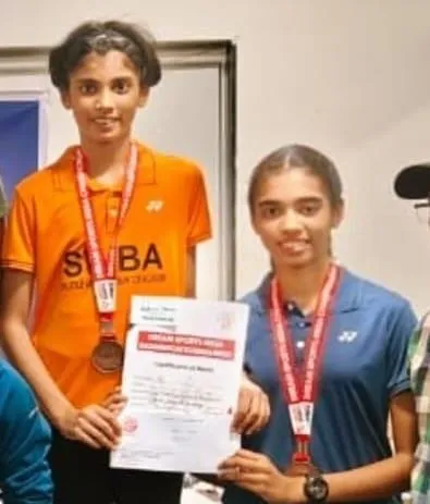 Netra Jhalani and Khanak Jhalani with their bronze medals from the team event at the MSSA Inter-School Championship.