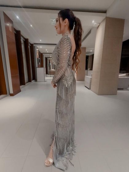 A silver-grey sequined gown for an anniversary party in Phuket. The high ponytail and sleek silhouette gave it a very modern and sophisticated feel.