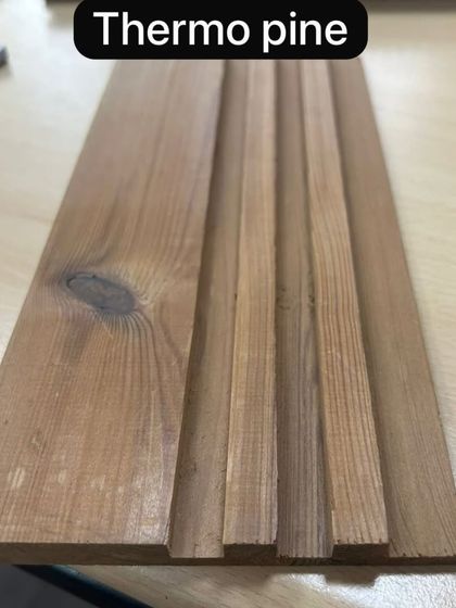A sample of Thermo Pine wood planks. This thermally modified wood is extremely durable and stable, making it ideal for outdoor applications like cladding and decking.