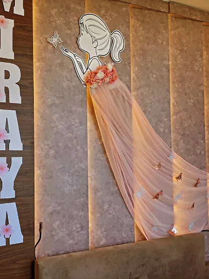 The beautiful fairy-themed wall decor for baby Miraya, showing the delicate details of the tulle and butterflies.