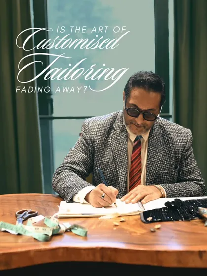 This image, featuring our founder at his desk, was part of an article discussing the art of customized tailoring. It captures the essence of our work: a blend of tradition and personal service.