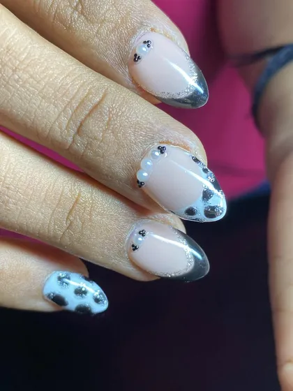 A closer look at the fun details in this animal print French tip set.