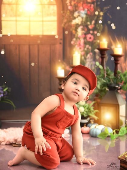 A curious little explorer in our enchanted autumn forest. The warm, glowing lanterns and rustic details create a magical atmosphere.