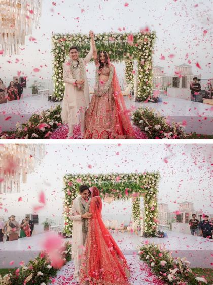 Two frames capturing the peak of the Varmala celebration, with the couple celebrating their union amidst a vibrant explosion of flower petals.
