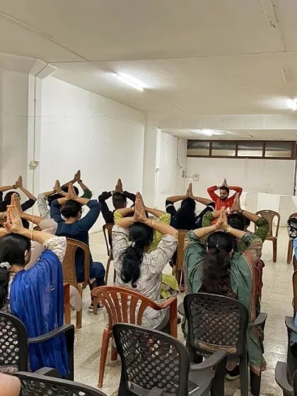 Our on-site sessions are practical and designed for the workplace. Here, we guide employees through desk yoga routines that can be done in office attire to alleviate physical strain, improve posture, and restore focus during the workday.