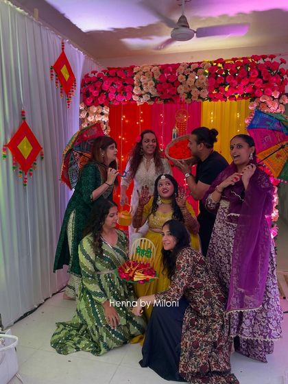 A fun, candid moment from a mehendi party with the bride and her friends.