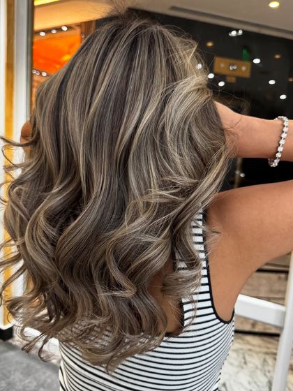 A final look at the stunning ash blond balayage, a perfect example of a modern, chic hair color.