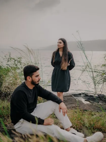 Another artistic composition with the couple in different planes of focus. This creates a thoughtful, narrative quality, as if they are characters in a larger story.