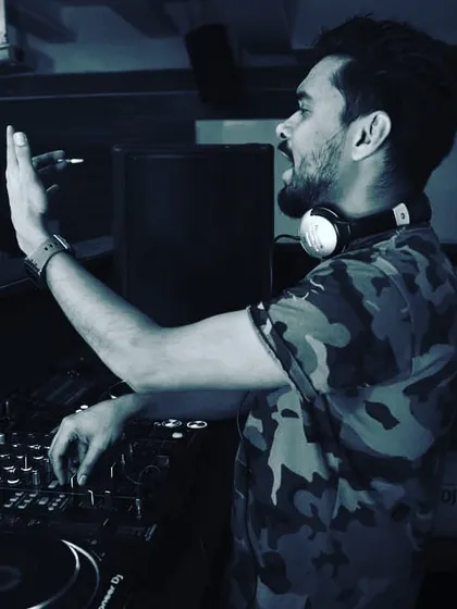 A moment of energy behind the decks. I believe in keeping calm and letting the party go on, guiding the night with the right tracks.