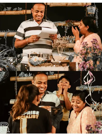 A family enjoying a surprise together. The husband reads a letter from his wife while their son looks on with excitement. It’s a beautiful moment of shared love.