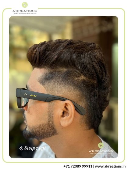 This stylish cut features a mid-fade with a longer, textured top. It's a versatile look that can be styled in multiple ways.