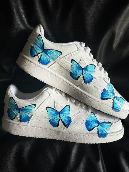Another pair shot of the blue butterfly custom sneakers.