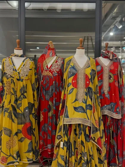 A full view of the bold floral print collection, showcasing different silhouettes perfect for making a statement at any celebration.