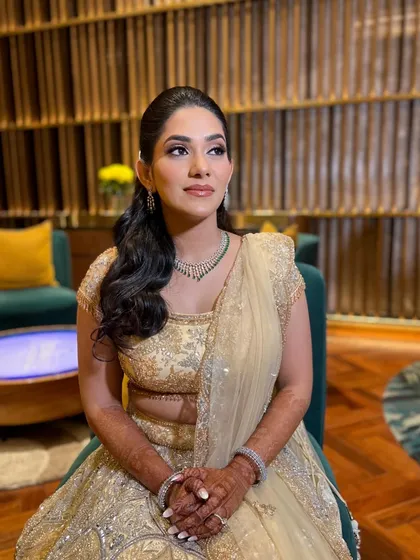 Another shot of Supriya's elegant Sangeet makeup. The focus is on clean lines and a radiant complexion.