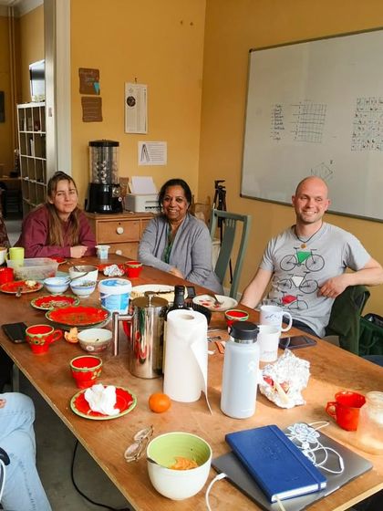 The team from Quest, an organization committed to child rights, shares a meal with our founder while planning for the upcoming IDEC conference in Belgium.