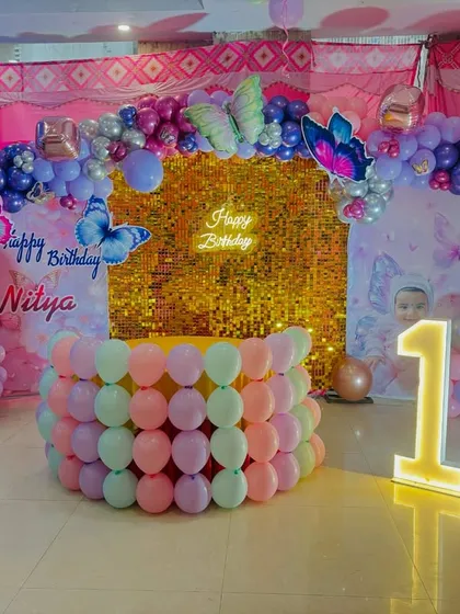 Another angle of the elaborate butterfly-themed birthday setup.