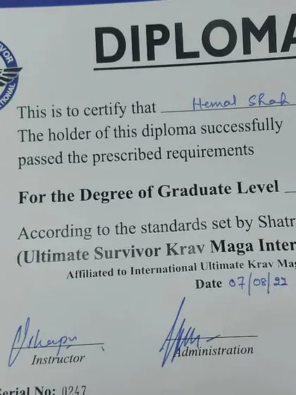 My diploma for Graduate Level W-1 in Krav Maga. This certification is from the International Ultimate Krav Maga Federation.