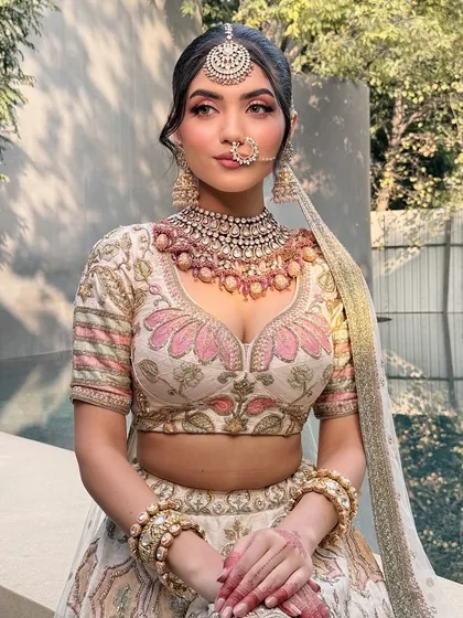 A close-up portrait of the Sabyasachi bride, focusing on the intricate jewellery from Raabta by Rahul and the flawless makeup that completes the look.