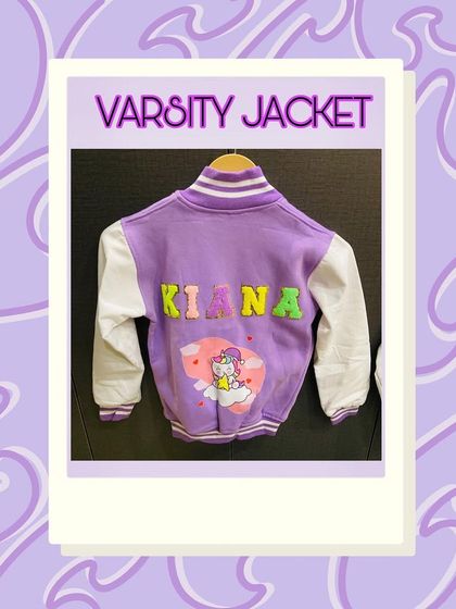 Another unicorn-themed varsity jacket, this time in a lovely lavender shade. We can customise the colors and patches to match your child's dreams.