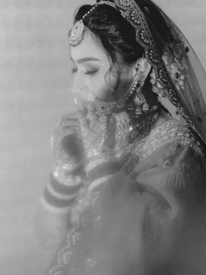 A hazy, dreamlike black and white portrait of the bride, creating a timeless and emotional image.