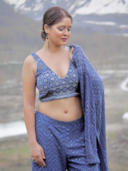 A final shot of the model looking serene in our blue Indo-Western outfit.