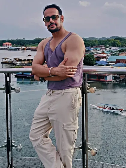 Taking a moment to enjoy the view at the Skywalk in Thailand. Travel is a great way to recharge and appreciate the world outside the gym.