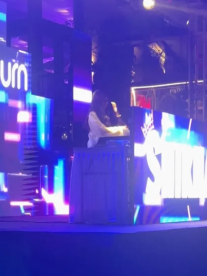 A side view of me on the Sunburn stage, surrounded by massive LED screens. The production level at these festivals is next level.