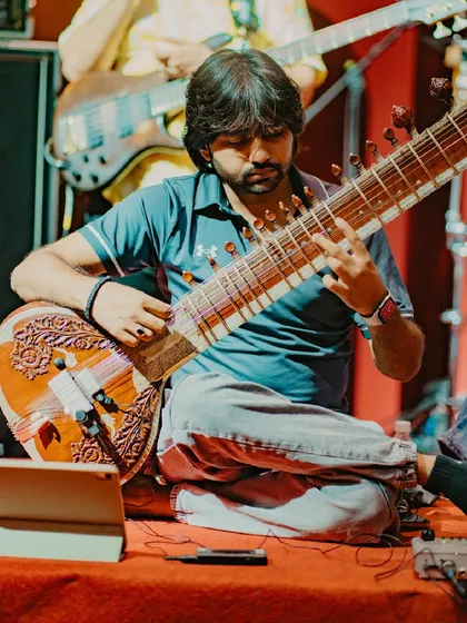 Here I am playing my Zitar during a soundcheck. This instrument is my go-to for fusion, rock, and modern Bollywood tracks where a punchy, electric string sound is needed to cut through the mix.